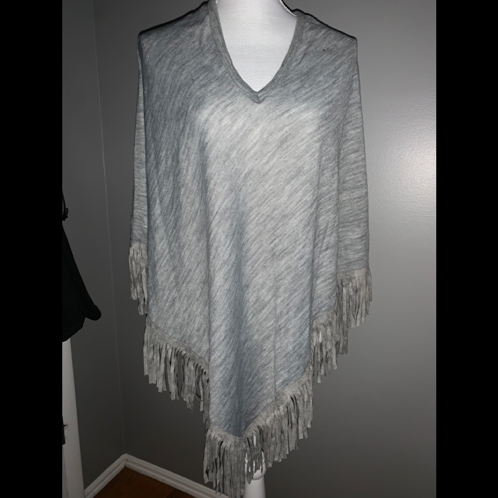 Gray cape with fringe